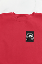 Red sweatshirt close-up with embroidered headphone logo on chest