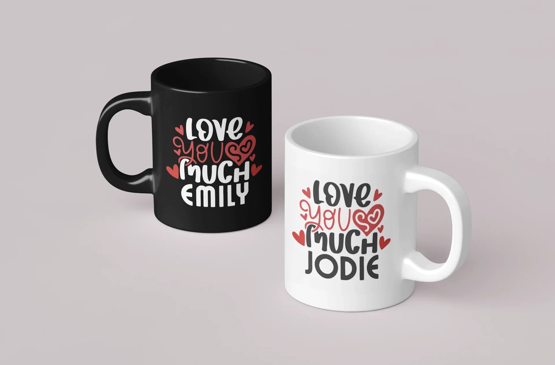 Personalised mugs set: black mug with EMILY, white mug with JODIE, 'Love you much'