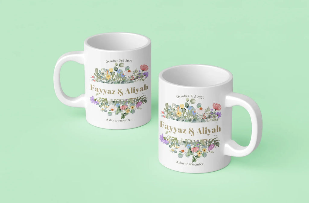 White mugs with floral design, 'Fayvaz & Aliyah' and 'October 3rd, 2023'