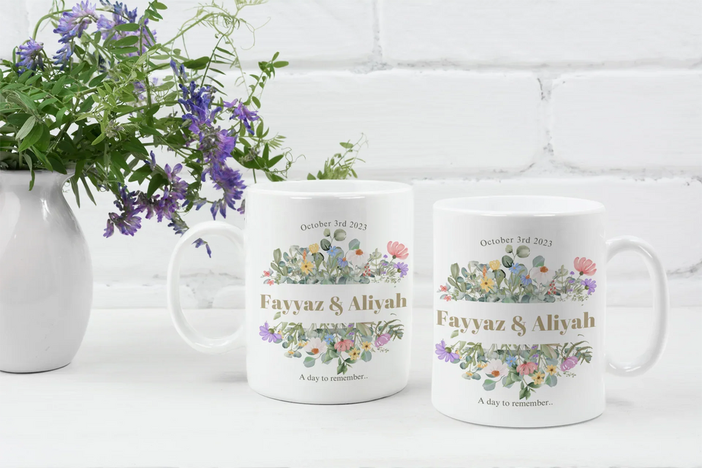 White mugs with floral designs, 'Fayvaz & Aliyah' and 'October 3rd, 2023'
