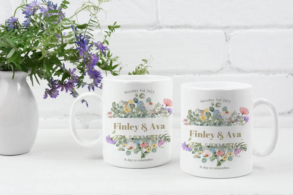 White mugs with floral designs, 'Fayvaz & Aliyah' and 'October 3rd, 2023'