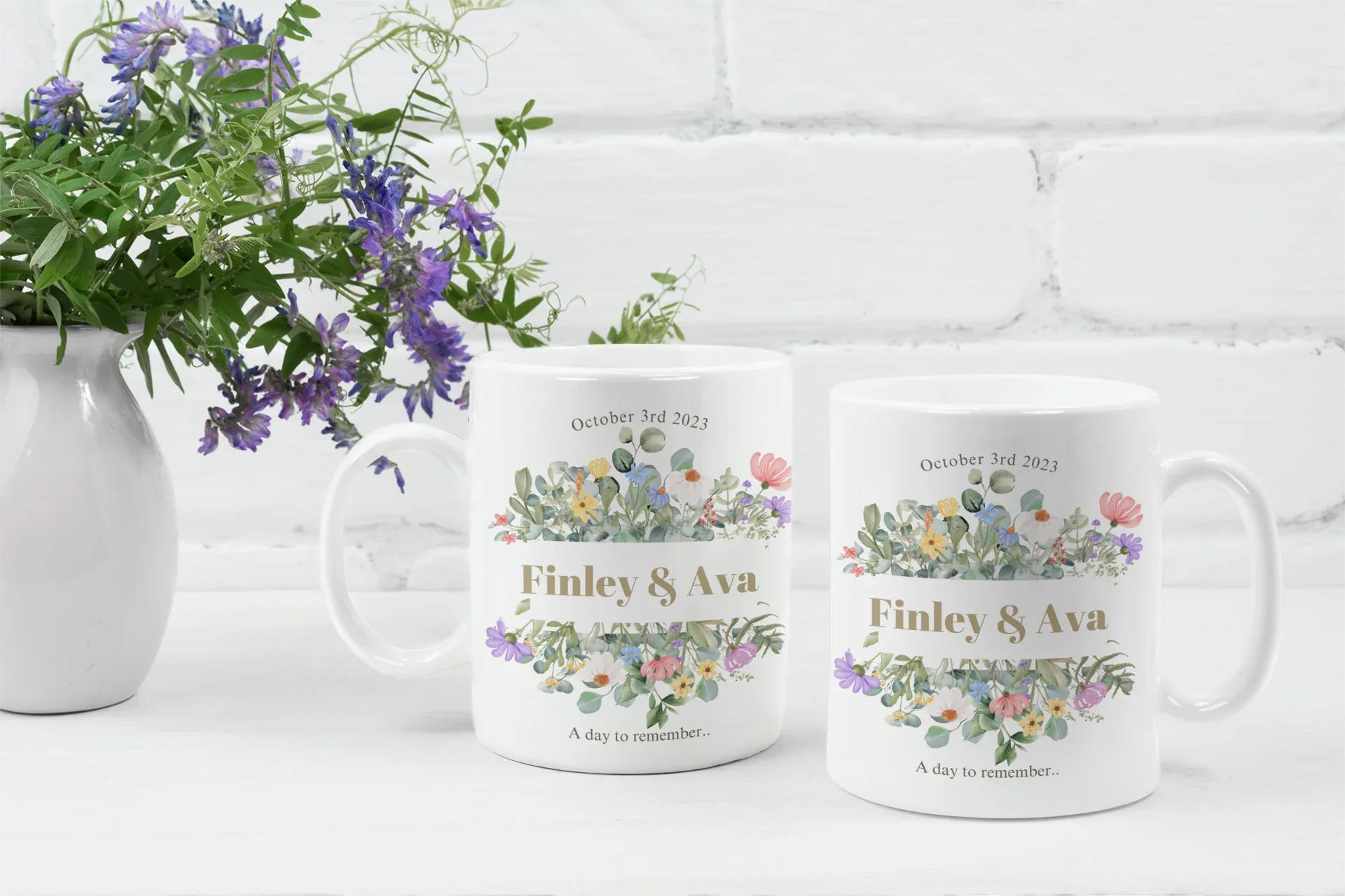 White mugs with floral designs, 'Fayvaz & Aliyah' and 'October 3rd, 2023'