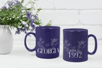 Set of two purple ceramic mugs with floral line art, “GLORIA” and “SINCE 1992”