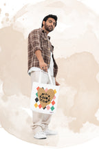 White canvas tote bag with heart logo and multicolor diamond pattern