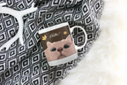 White ceramic mug with cat face and 'Hello!' text graphic on front