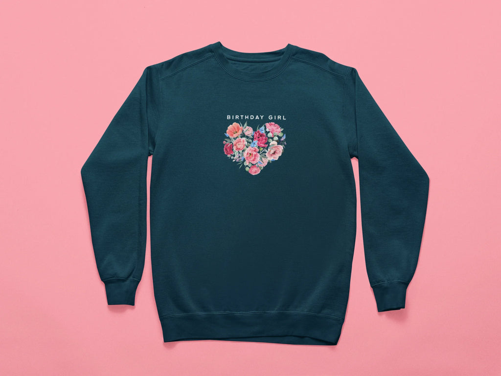 Dark green sweatshirt with “BIRTHDAY GIRL” text and floral heart graphic