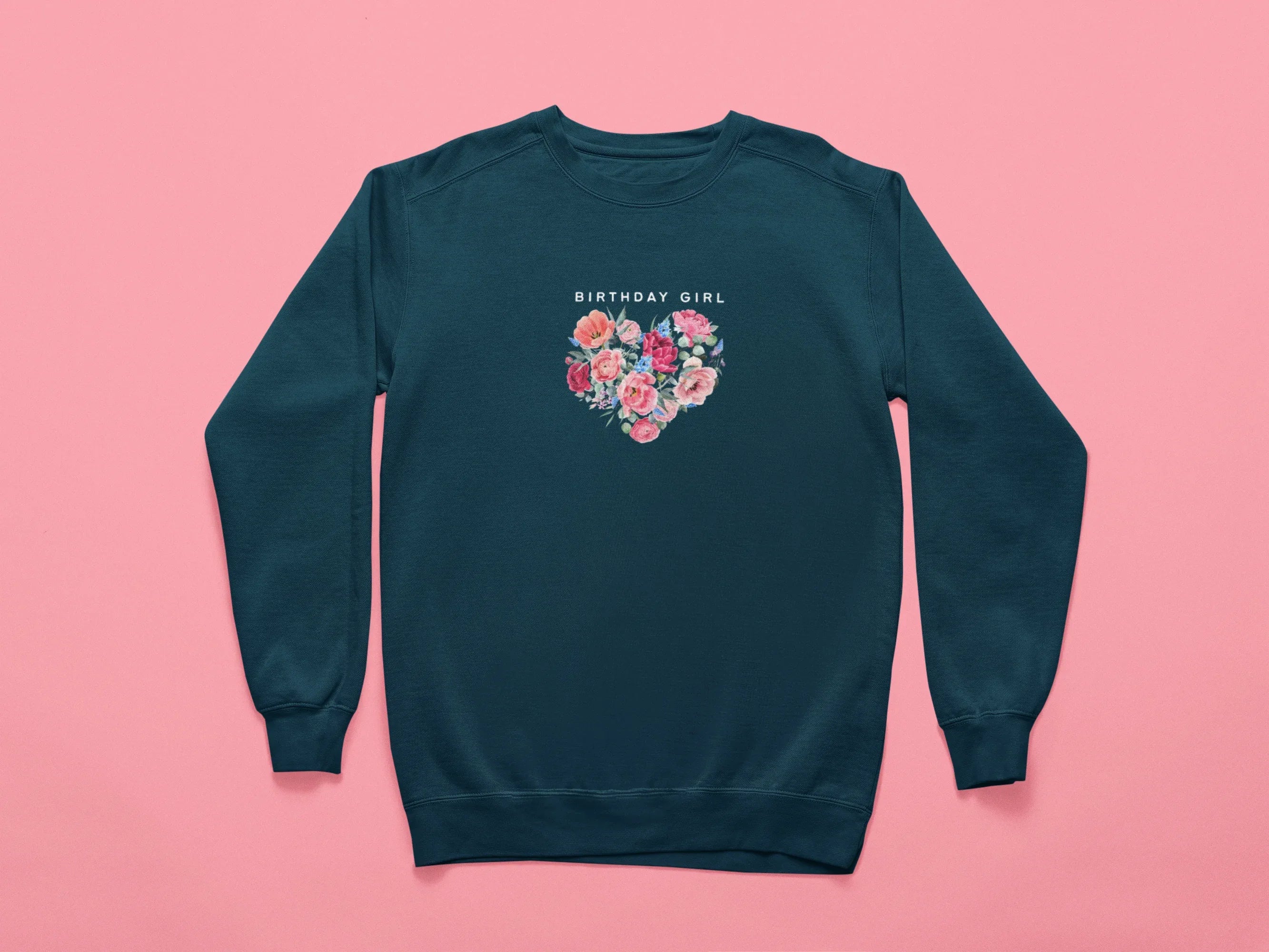 Dark green sweatshirt with “BIRTHDAY GIRL” text and floral heart graphic