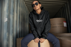 Black unisex hoodie with hood, 'GOD' chest logo