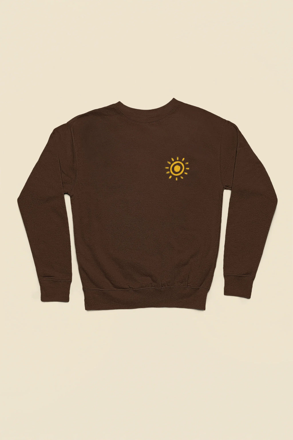 Chocolate sweatshirt with small sun graphic on the front chest.