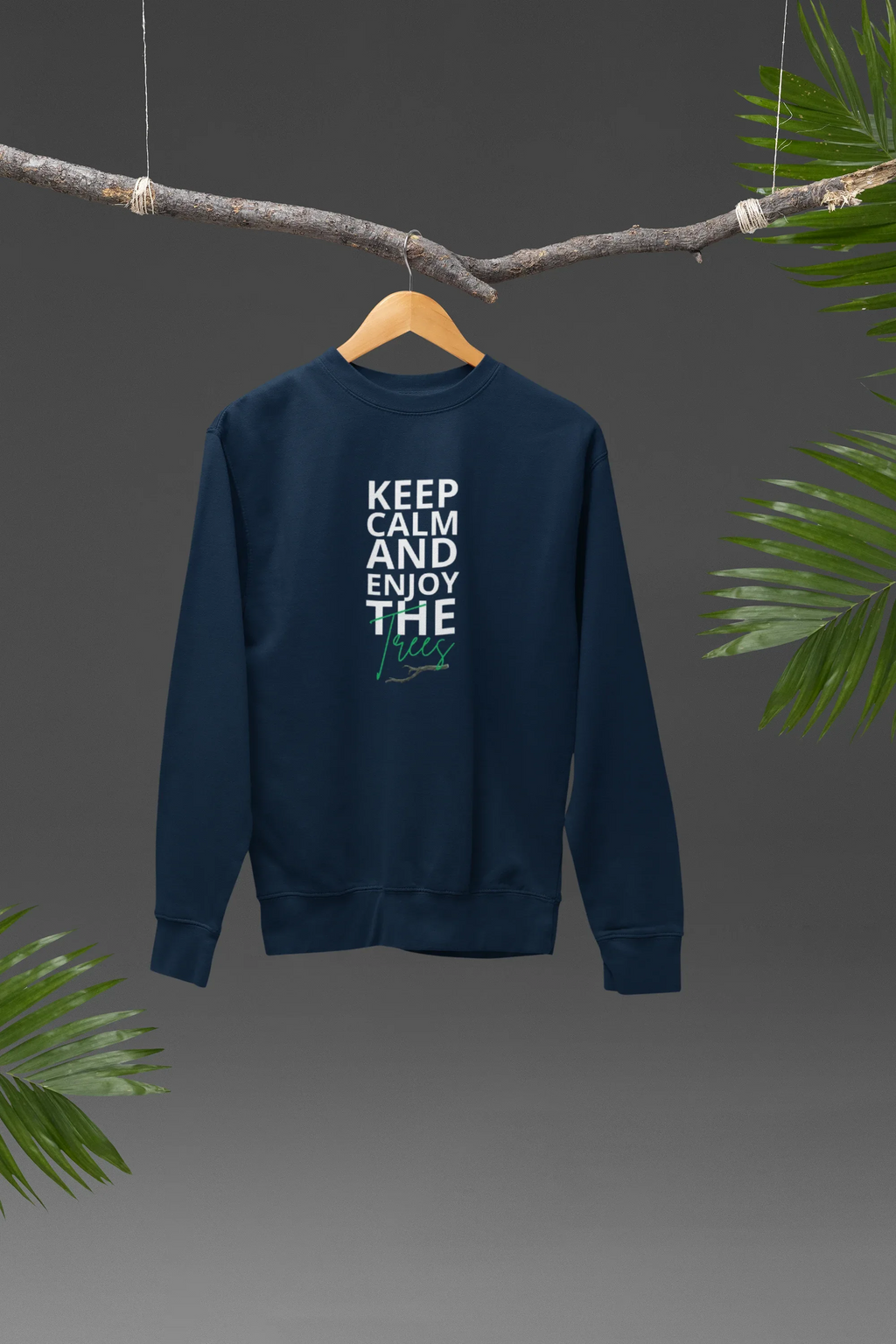 Navy sweatshirt hanging on wooden hanger, Keep Calm and Enjoy the waves print