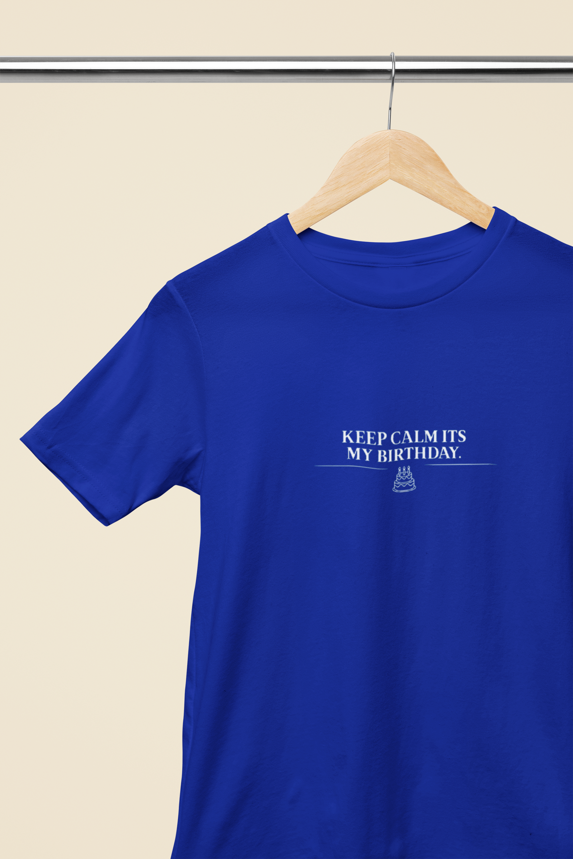 Royal blue crew-neck T-shirt with front graphic text "Keep Calm Its My Birthday"