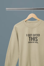 Beige sweatshirt with front graphic text: "I GOT GIFTED THIS" from "MY KIDS".