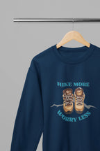Navy crewneck sweatshirt with 'Hike More, Worry Less' boot graphic on the front