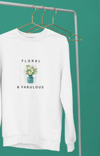 White sweatshirt with small floral vase graphic and 'Floral & Fabulous' lettering