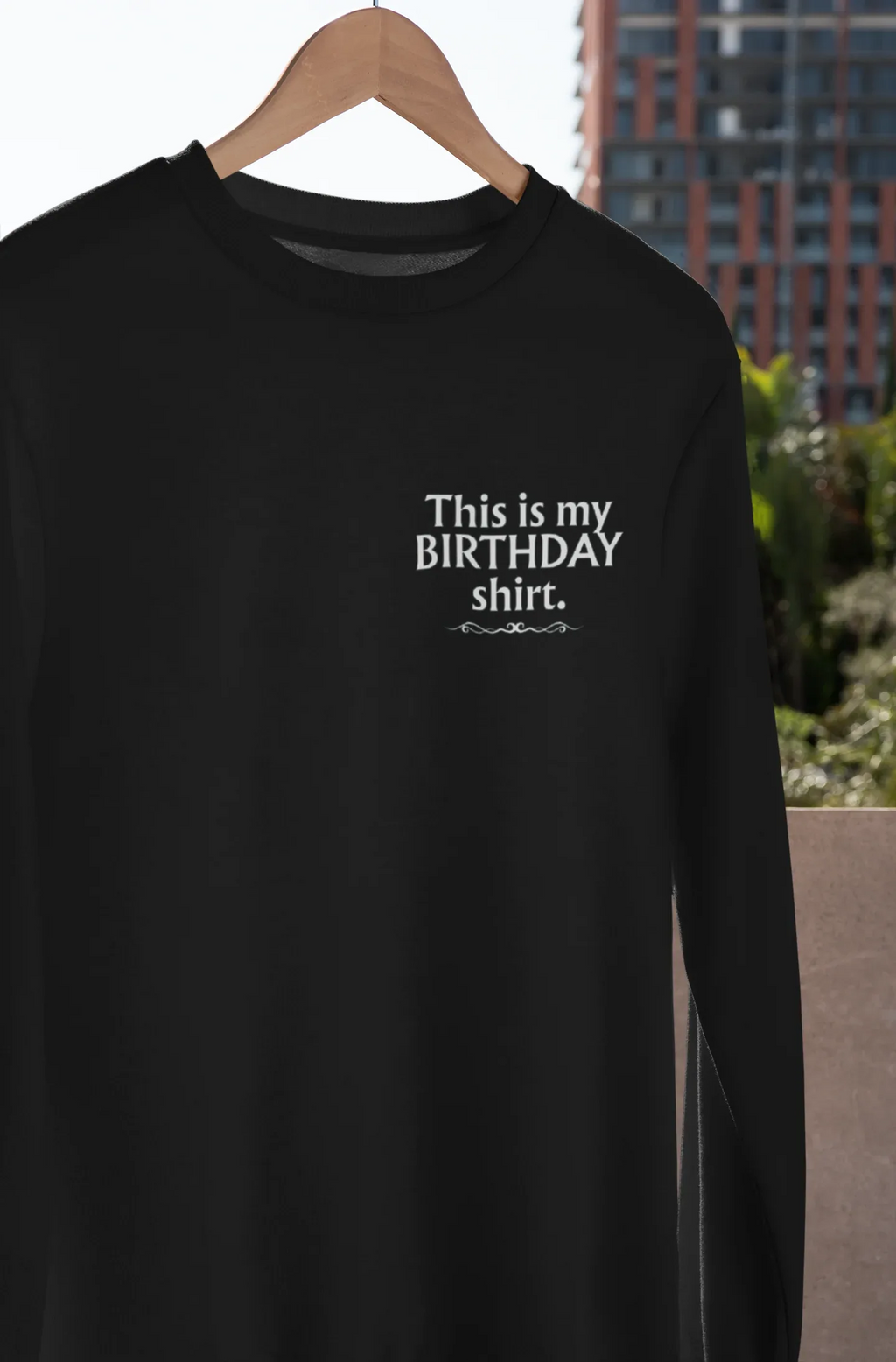 Black sweatshirt with 'This is my BIRTHDAY shirt' chest print