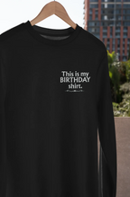 Black sweatshirt with 'This is my BIRTHDAY shirt' chest print