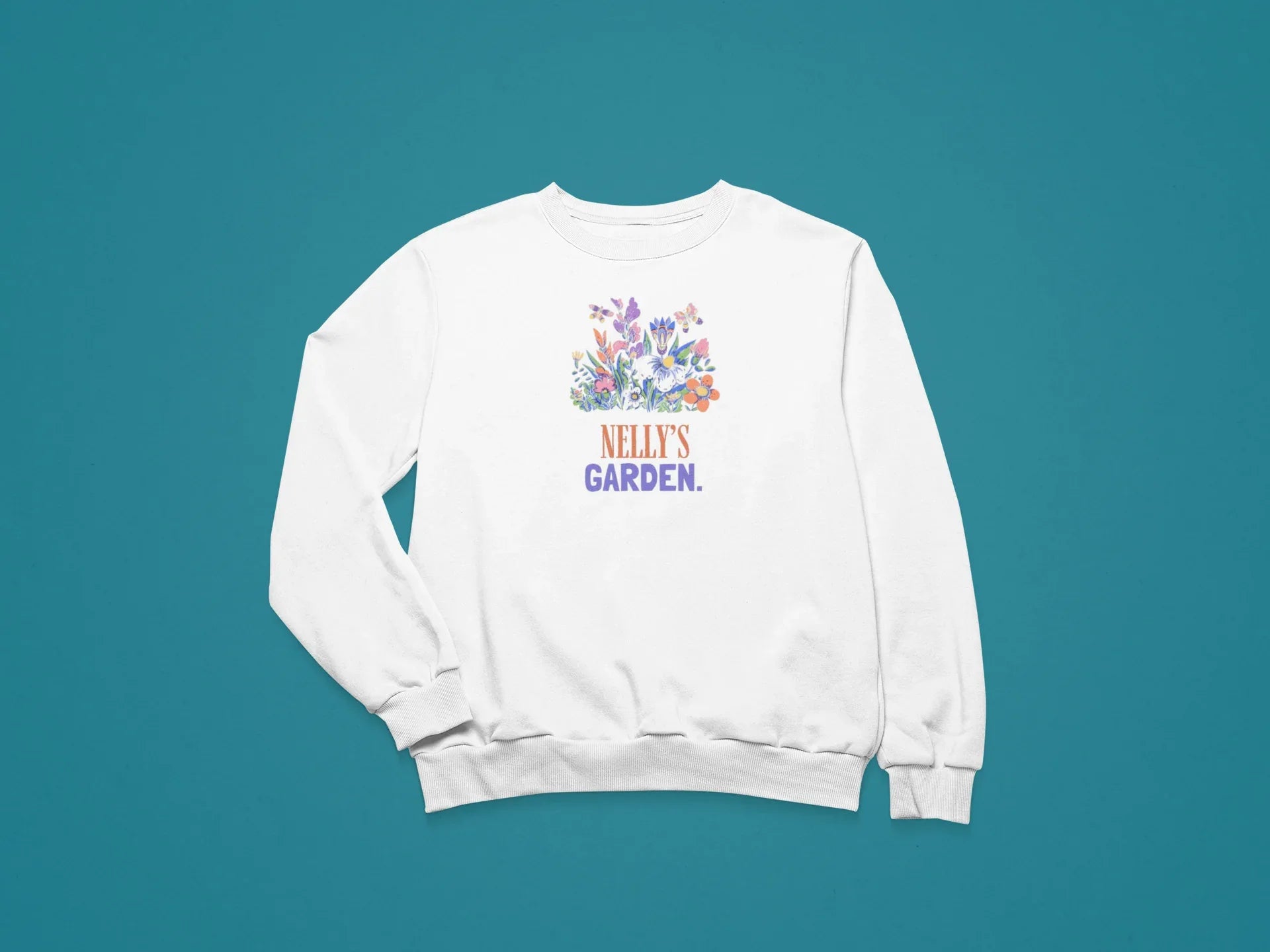 White crewneck sweatshirt, back view, with 'Nelly's Garden' floral crest print.