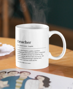 White ceramic teacher mug with front 'teacher' text and quote, right handle