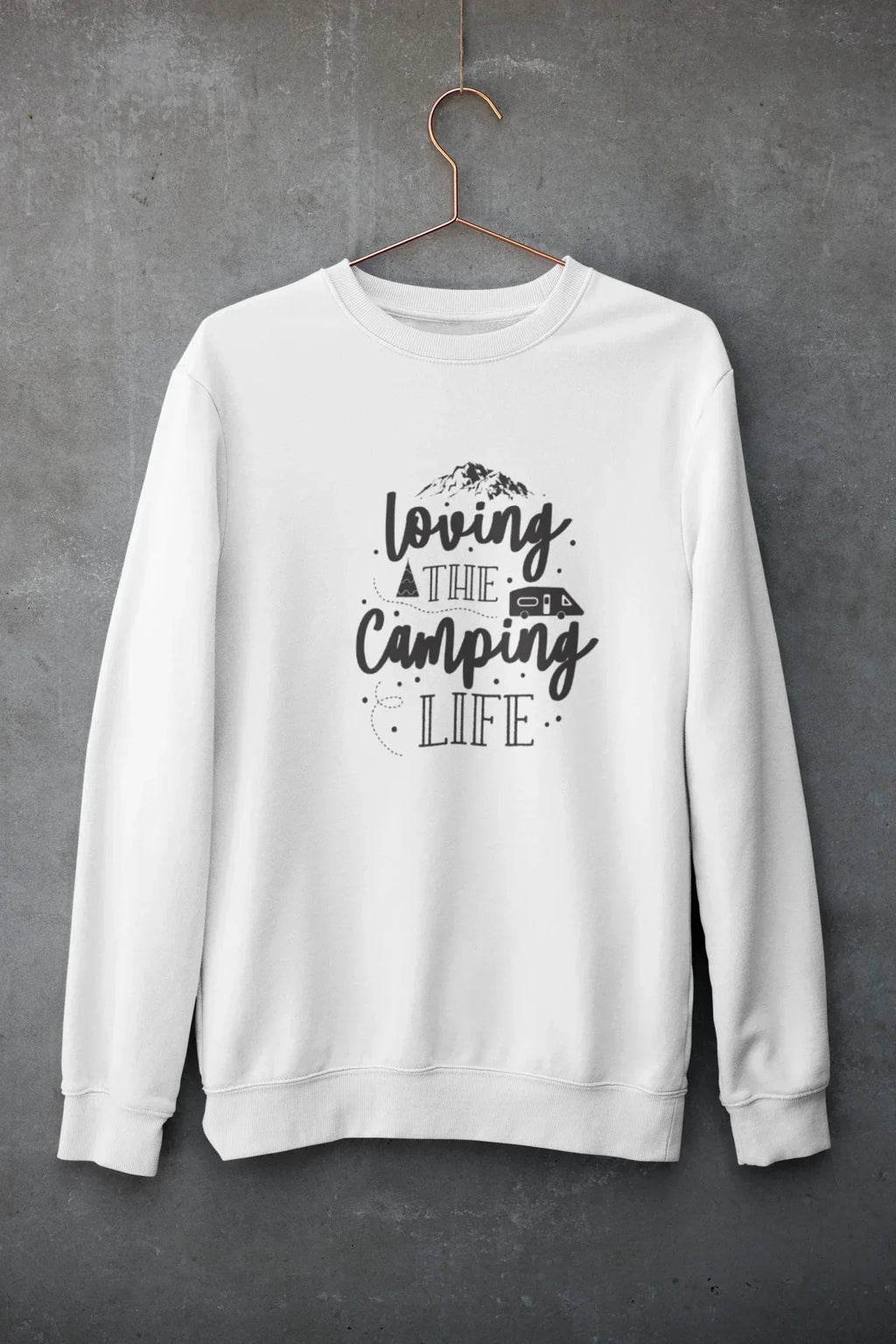 White crewneck sweatshirt hanging with "Loving the Camping Life" graphic on front