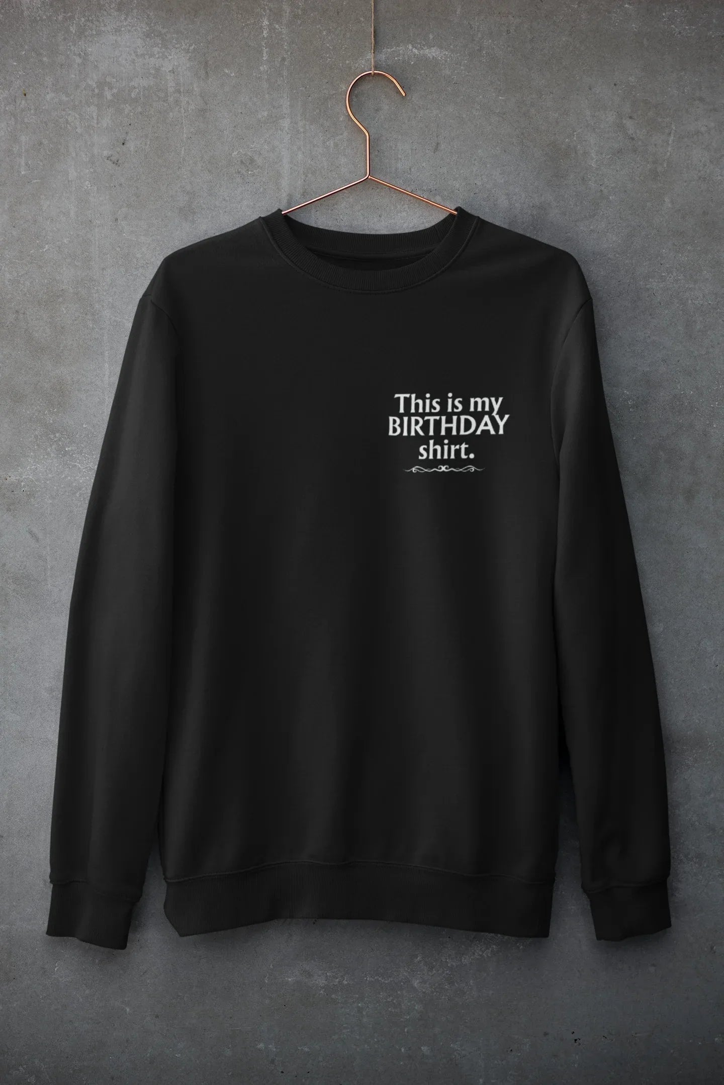 Black crewneck sweatshirt with 'This is my BIRTHDAY shirt' chest print