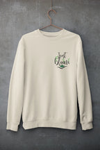 Cream crewneck sweatshirt with floral “Just Bloom” graphic