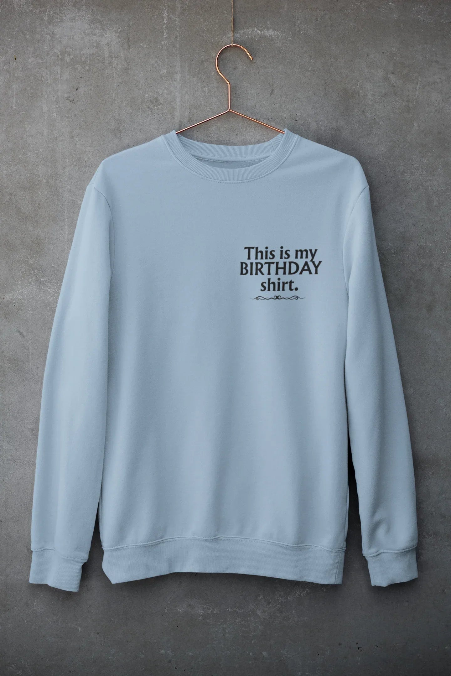 Powder blue sweatshirt with 'This is my BIRTHDAY shirt' chest print