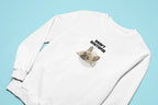 White sweatshirt with “DON’T DISTURB” text and sleeping French Bulldog graphic on back.