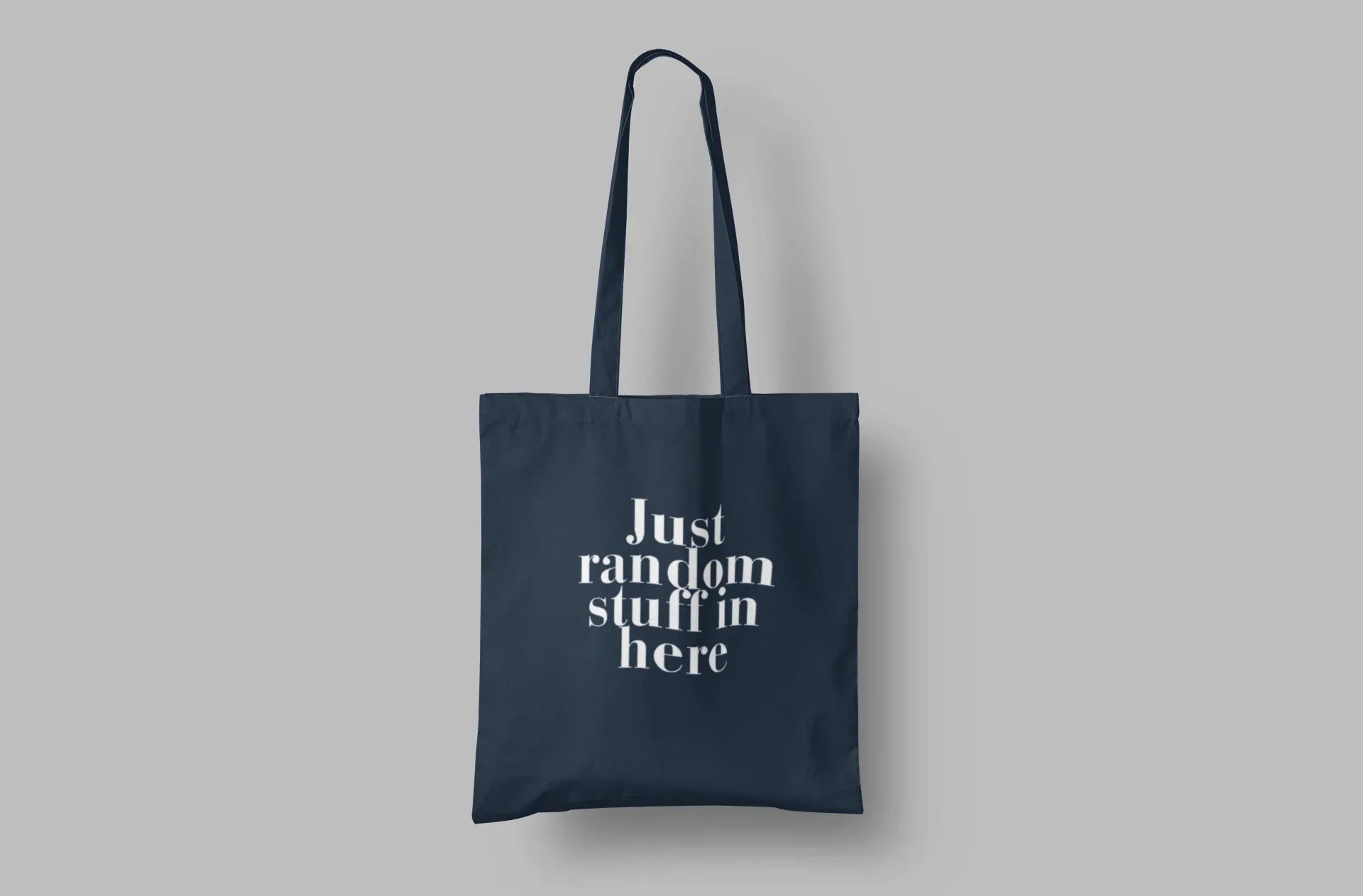 Navy cotton tote bag with custom text "Just random stuff in here"