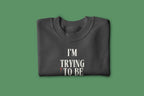 Charcoal gray sweatshirt with 'I'm Trying to Be a Nature Person' slogan