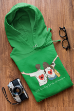 Green hoodie with couple heart graphic and 'Still Waiting for the Honeymoon' lettering.