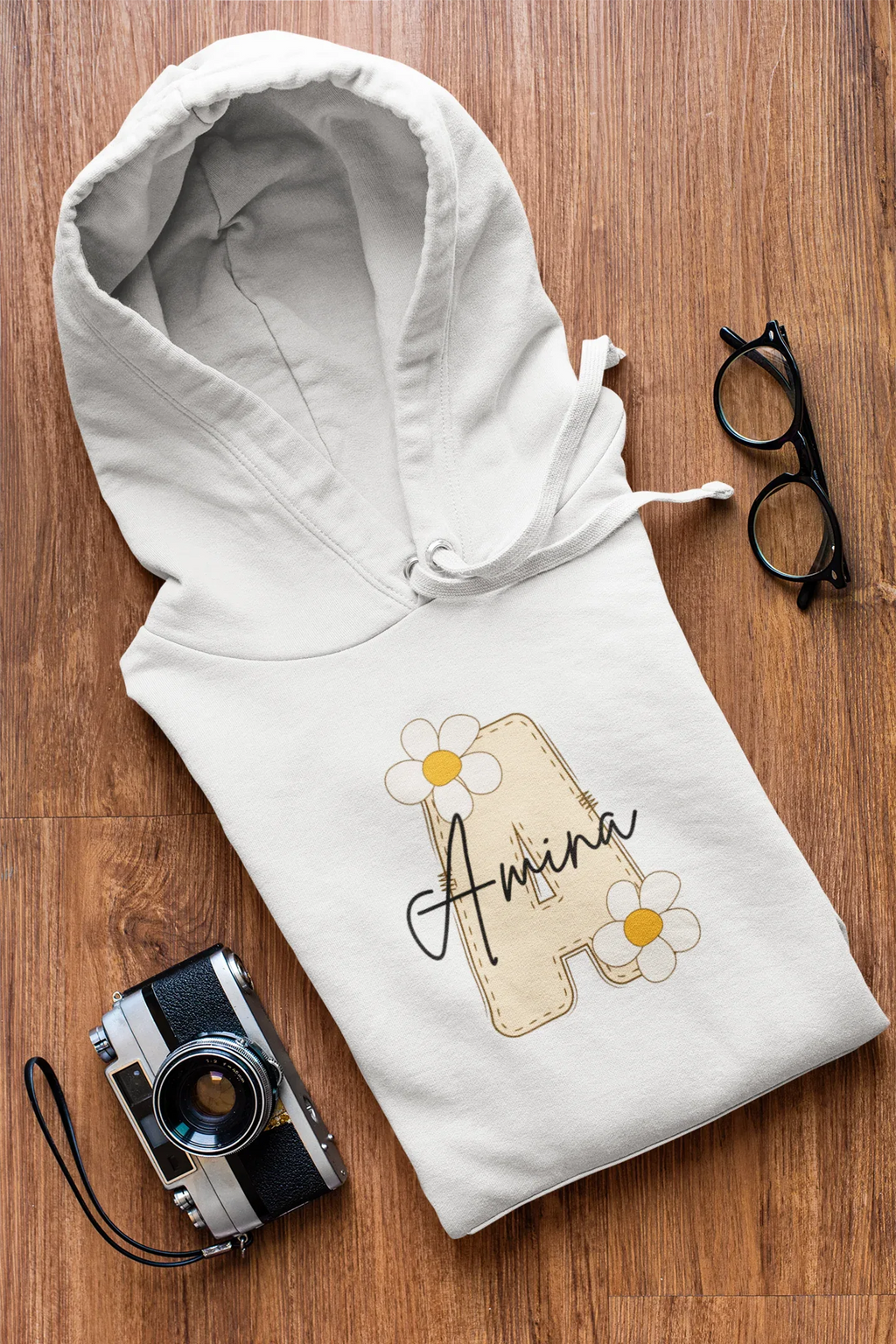 Kids white hoodie with floral name graphic on chest, front pouch pocket