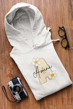 Kids white hoodie with floral name graphic on chest, front pouch pocket