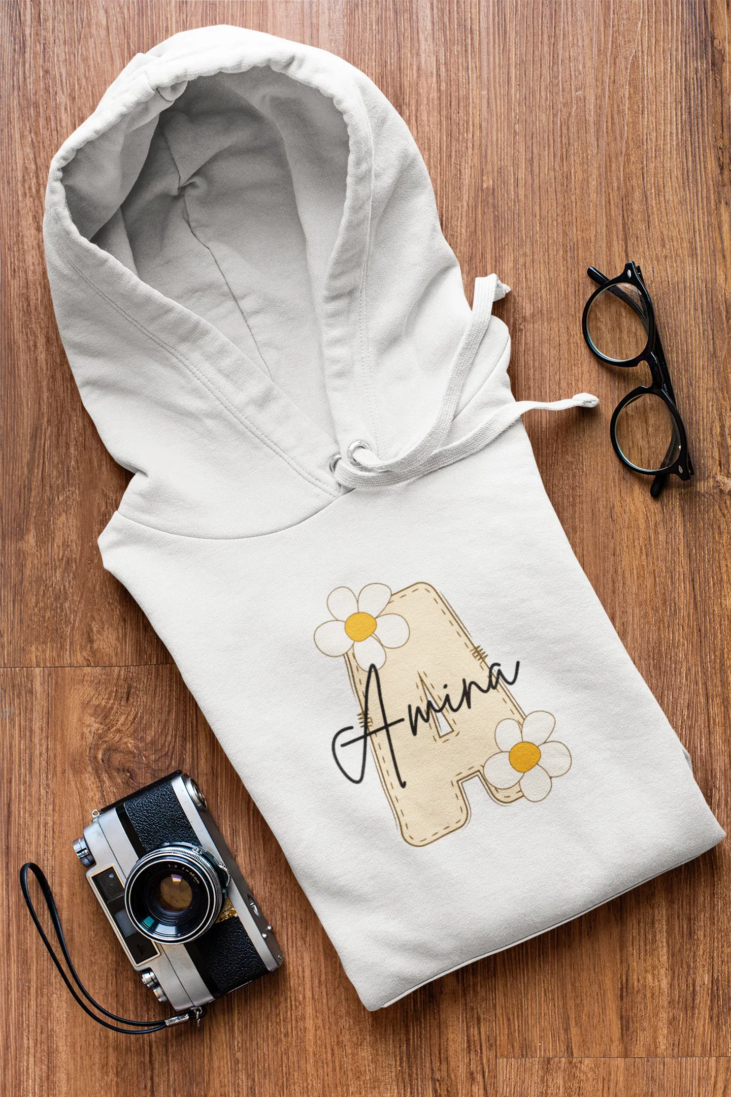 Kids white hoodie with floral name graphic on chest, front pouch pocket