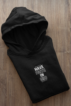Black unisex hoodie sweatshirt folded flat with 'Have Faith in God' graphic