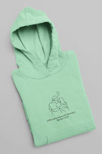 Mint green hooded sweatshirt folded with front couple graphic and hood