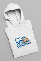White hoodie sweatshirt folded with hood and blue “Not a Regular Mum, Coffee Mum” print