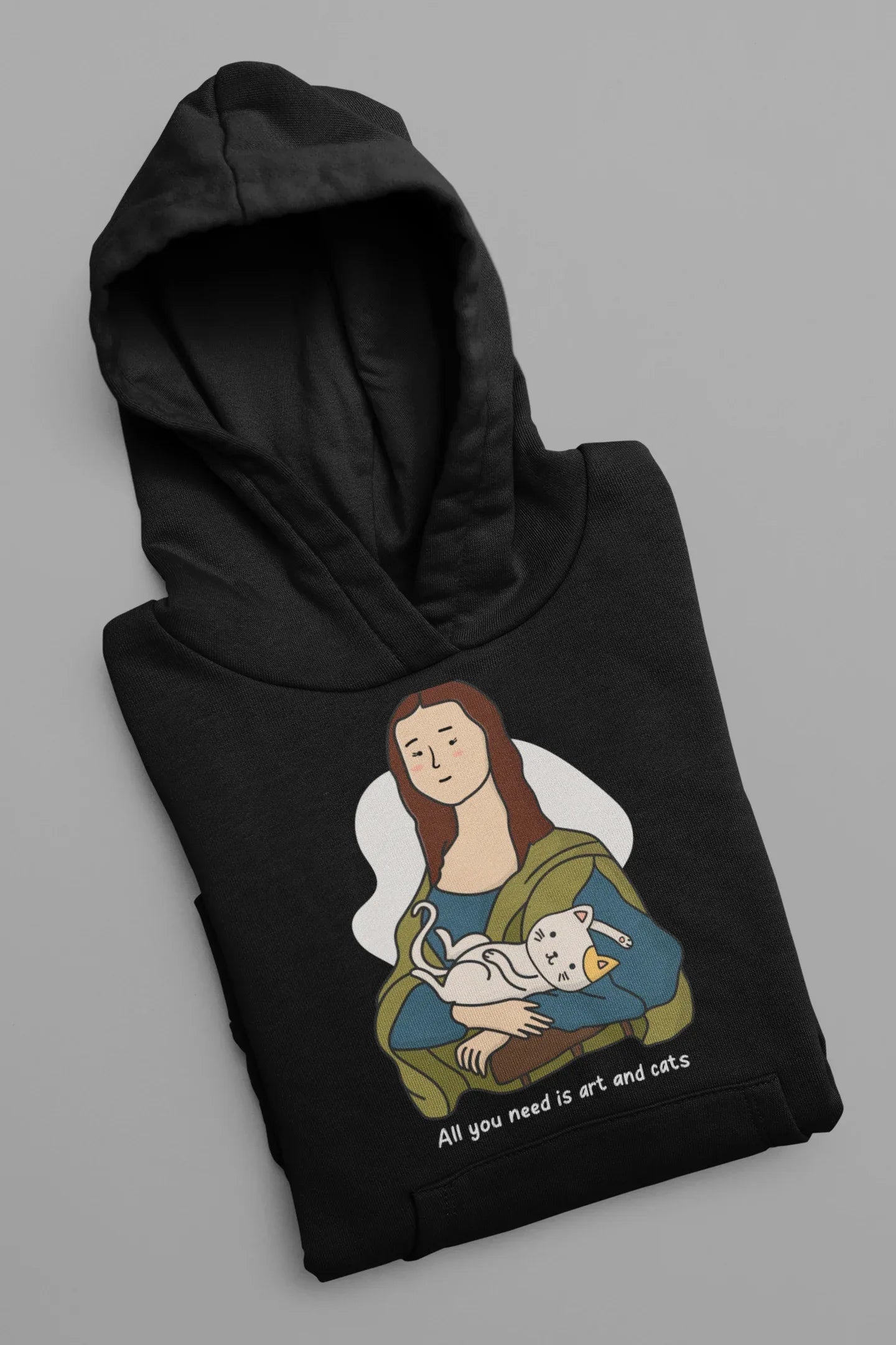 Black hoodie folded with cat-and-art graphic on front