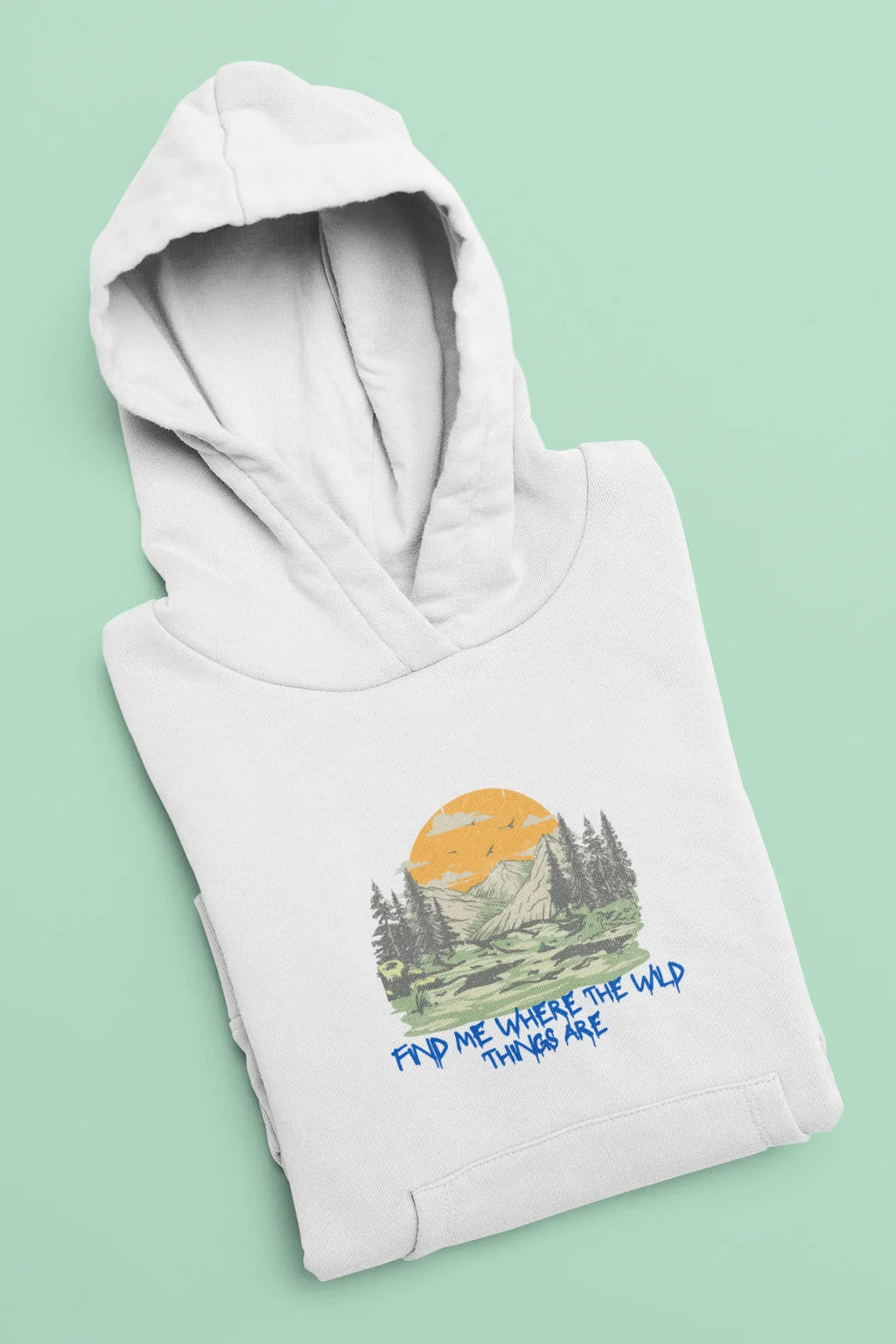 White hoodie folded, hooded sweatshirt with mountain forest graphic and blue text