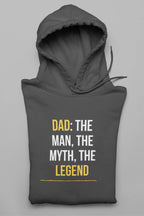 Dark gray hoodie with “DAD: THE MAN, THE MYTH, THE LEGEND” chest graphic