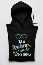 Black unisex hoodie with drawstring hood and front teacher slogan graphic