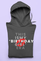 Charcoal gray pullover hoodie with front graphic text "THIS IS MY BIRTHDAY GIRL ERA"