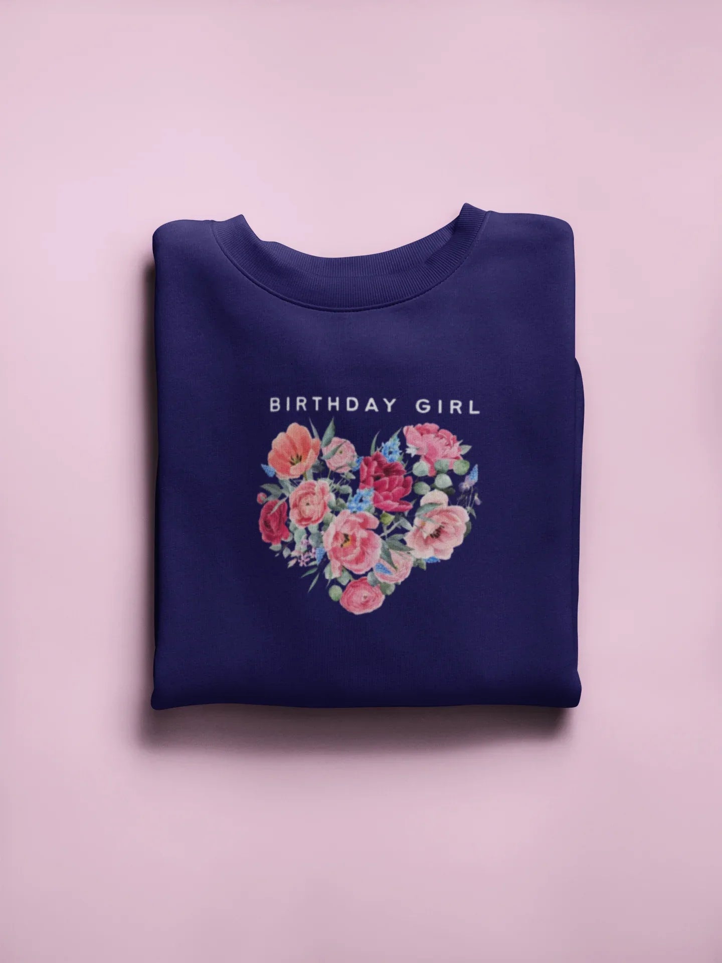 Navy crewneck sweatshirt with “Birthday Girl” text and floral heart graphic