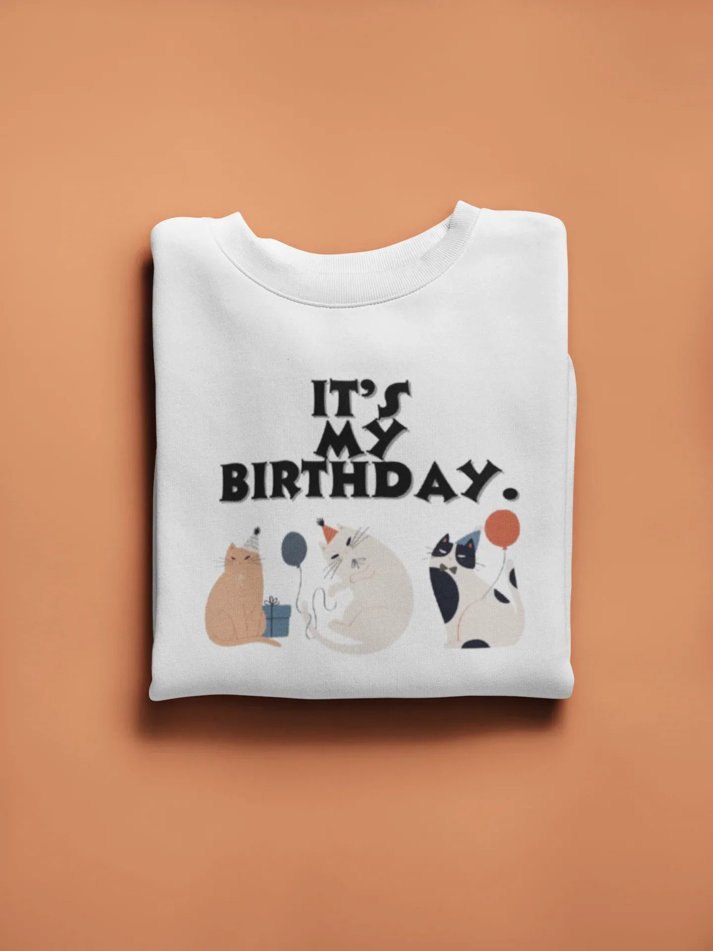 White crewneck cat birthday sweatshirt with front graphic cats and “It’s my birthday” text