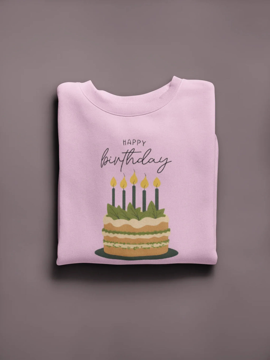 Light pink crewneck sweatshirt with “Happy birthday” cake and candle graphic