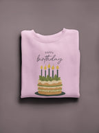 Light pink crewneck sweatshirt with “Happy birthday” cake and candle graphic