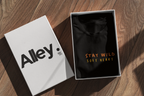 Black hoodie laid in open box, showing Wild West emblem and Stay Wild Soft Heart text
