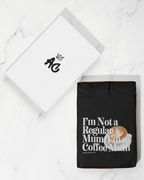 Black hoodie sweatshirt with hood and front “Not a Regular Mum, Coffee Mum” print