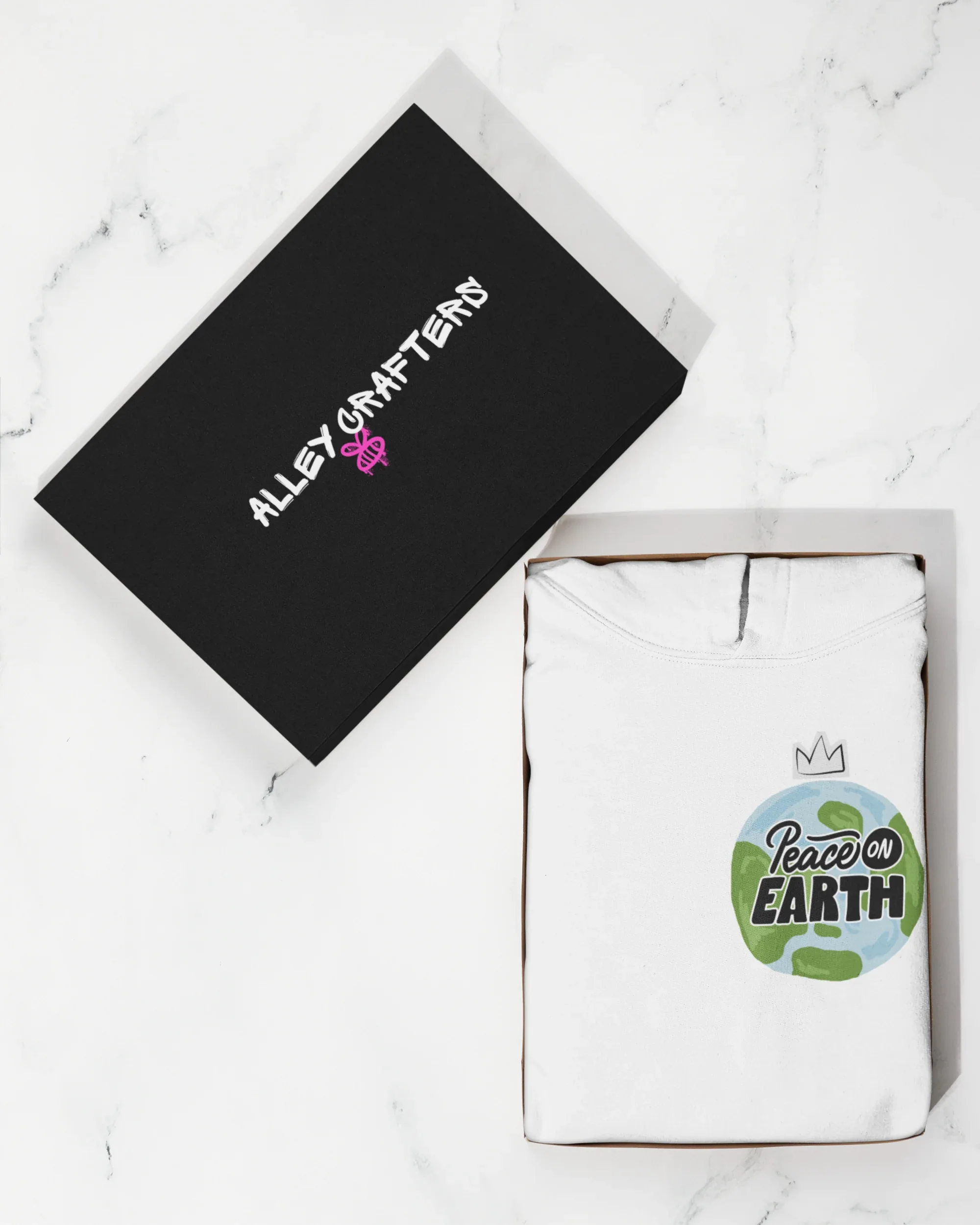 Packaged Arctic white hoodie with Peace on Earth globe chest logo in clear bag