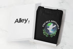 Black crewneck sweatshirt with a circular dove and leaf nature graphic on front.