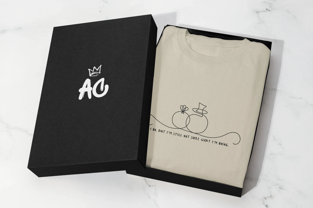 Cream unisex hoodie in a box set, front line-art wedding rings graphic